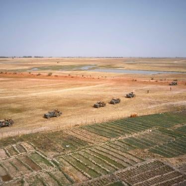 An aerial photo shows Malian Army vehicles patrolling near the town of Konna on March 20, 2021.