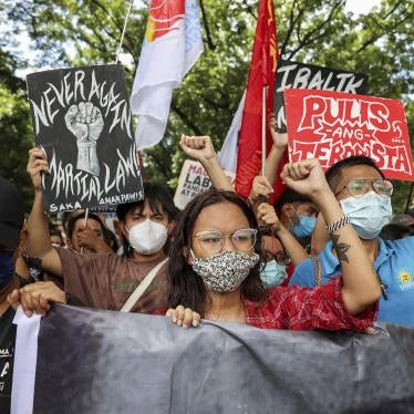 Activists protest against presidential candidate Ferdinand Marcos Jr. during a rally outside the Commission on Human Rights in Quezon City, the Philippines.