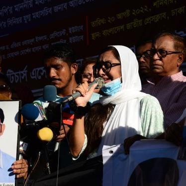 Relatives hold portraits of their missing family members during protest rally on behalf of victims of enforced disappearance by security forces, in front of National Press Club in Dhaka, Bangladesh, August 20, 2022.