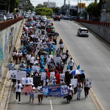 People participate in a protest to demand the release of their relatives who were detained during the government's state of emergency, in San Salvador, El Salvador August 9, 2022.