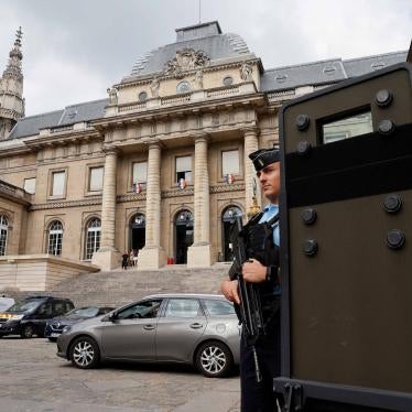 A French gendarme stands guard at Paris' criminal courthouse, August 26, 2022. 
