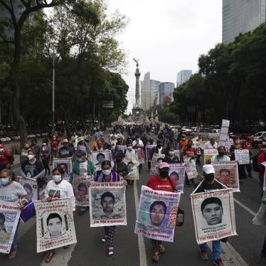 Families and friends march in Mexico City seeking justice for the missing 43 Ayotzinapa students on the eighth anniversary of their disappearance.