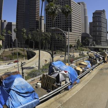 An encampment on Beaudry Avenue along Interstate 110 in downtown Los Angeles.