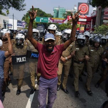 A protestor shouts against the detention of two student leaders in Sri Lanka.