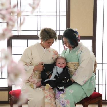 Human rights activists Mamiko Moda and Satoko Nagamura with their son, who they had in Japan using a donor.