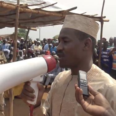 Hassan Bouba addresses residents of Ngakobo while on a ministerial trip. 