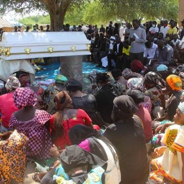 Relatives and friends gather at the October 28 burial ceremony of Chadian journalist, Oredje Narcisse,  killed during a pro-democracy demonstration, in N'Djamena, Chad.