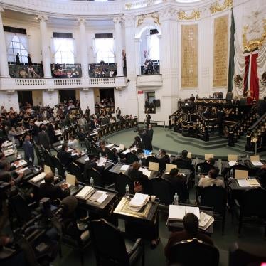 Legislators attend a session of Mexico City’s Congress 
