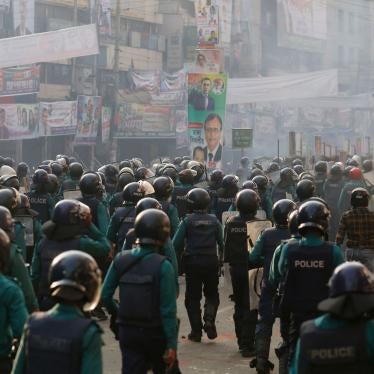 Police confront Bangladesh Nationalist Party (BNP) activists gathered in front of the party's central office in Dhaka.
