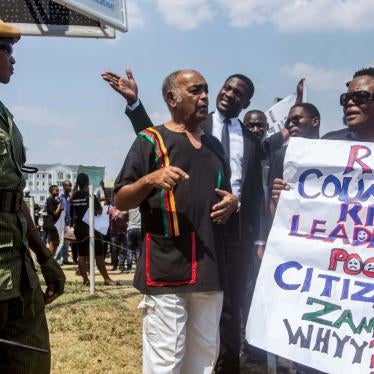 outside protest zambia human rights watch