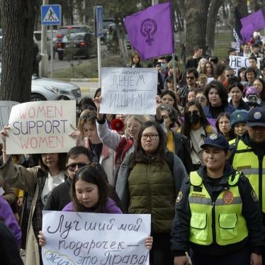 Women march in a protest for International Women's Day