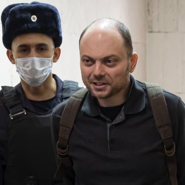 Russian opposition activist Vladimir Kara-Murza is escorted to a hearing in a court in Moscow, Russia, February 8, 2023