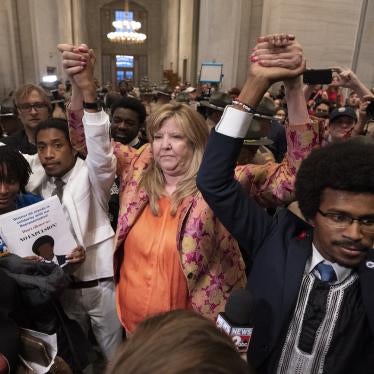 Former Rep. Justin Jones, D-Nashville, Rep. Gloria Johnson, D-Knoxville, and former Rep. Justin Pearson, D-Memphis, raise their hands outside the House chamber after Jones and Pearson were expelled from the legislature April 6, 2023.