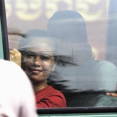 NagaWorld's union leader, Chhim Sithar, sits in a prisoner van outside the municipal court in Phnom Penh, Cambodia.