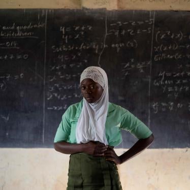 A student poses for a portrait in the classroom of her school in Koidu, Kono district, Sierra Leone, on November 24, 2020. 