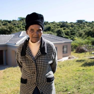 Nozala Ndoyana, 84, in front of her home 