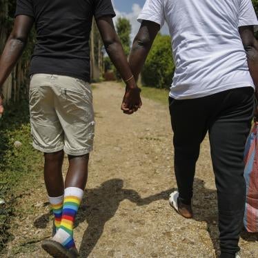 Gay Ugandan refugees who fled from their country to neighboring Kenya, return after shopping for food in Nairobi, Kenya, June 11, 2020.