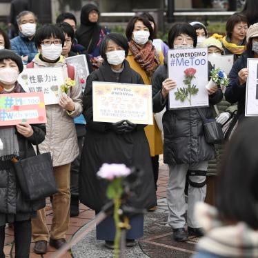 Protesters attend a gathering of the Flower Demo movement against sexual violence in Nagoya, Japan, March 8, 2020.