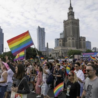 People march through the street with rainbow flags during the Warsaw's Equality Parade, Poland, June 17, 2023. 