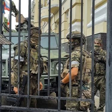 Servicemen of the Wagner Group military company guard an area at the headquarters of the Southern Military District in Rostov-on-Don, Russia, Saturday, June 24, 2023. (AP Photo)