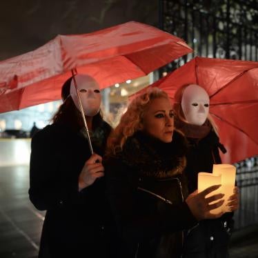 Kate McGrew and other members of Sex Workers Alliance Ireland hold a candlelit vigil outside Leinster House in Dublin, Ireland to mark International Day to End Violence against Sex Workers, December 17, 2014.