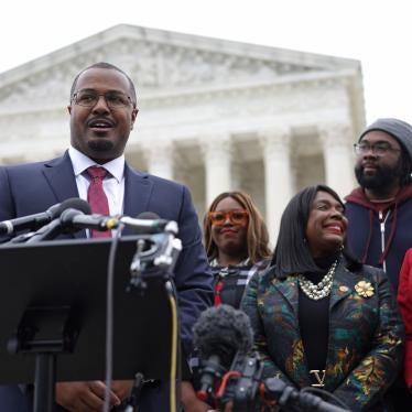 Lead counsel for the plaintiffs Deuel Ross (2nd left) speaks to members of the press as President and Director-Counsel of the NAACP Legal Defense Fund Janai Nelson (right), plaintiff Evan Milligan (2nd right), U.S. Rep. Terri Sewell (D-AL) (3rd right), and Khadidah Stone, plaintiff (4th right) listen after the oral argument of the Allen v. Milligan case at the U.S. Supreme Court in Washington, DC, US, October 4, 2022.