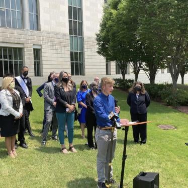 Dylan Brandt speaks at a news conference outside the federal courthouse in Little Rock, Arkansas, US, July 21, 2021.