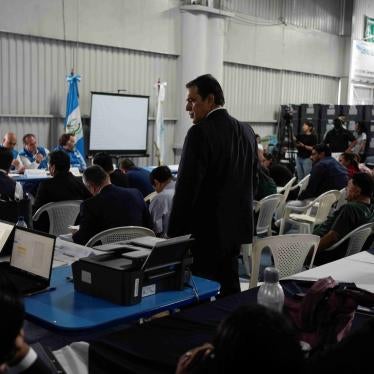 Electoral authorities review records in a meeting with political parties' lawyers in Guatemala City, July 4, 2023, after the Constitutional Court ordered an investigation in response to a case brought by political parties whose candidates lost in the preliminary tabulation of ballots.