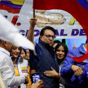 Presidential candidate Fernando Villavicencio waves an Ecuadorean flag during a campaign event at a school before he was shot to death outside the same school in Quito, Ecuador, August 9, 2023.