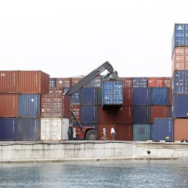 A crane arranges containers at the Port of Zanzibar, Tanzania, July 19, 2012.