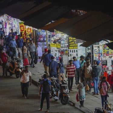 People walk on Pettah Street in Colombo, Sri Lanka, on February 3, 2023.