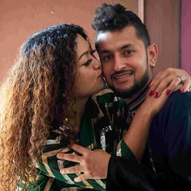 Surendra Pandey, right, and Maya Gurung, who married six years ago, pose for a photograph 