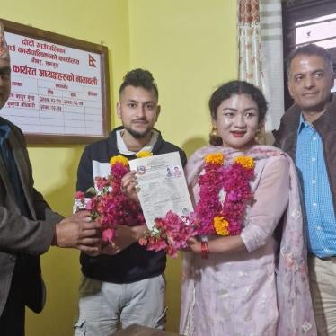 Surendra Pandey and Maya Gurung register their marriage with authorities in Dordi, a municipality in the bride’s home district of Lamjung, Nepal, November 29, 2023.