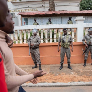 Mozambique police forces are stationed outside the Technical Secretariat of Electoral Administration building as supporters of the Mozambican opposition party Mozambican National Resistance (RENAMO) demonstrate in Maputo on October 17, 2023.