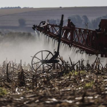 A worker applies fungicide after harvesting a soybean crop in the Central-West Region of Paraná, Brazil, September 16, 2023