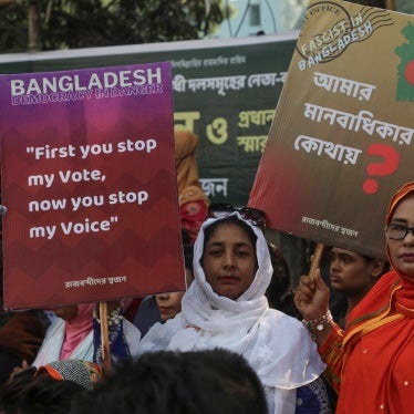 A relative of political violence victims during a protest in Dhaka, Bangladesh, November 28, 2023.