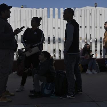 Asylum seekers wait at the US-Mexico border