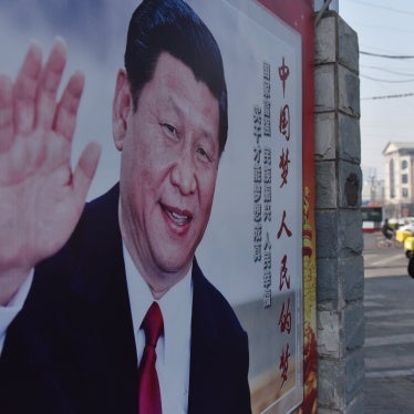 A poster of Chinese President Xi Jinping on a street in Beijing on February 26, 2018