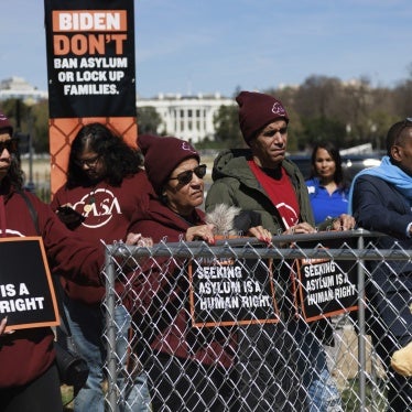 Demonstrators gather near the White House in Washington, DC for a protest