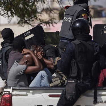 Detained demonstrators on a police pick up during a protest against the postponement of the February 25, 2024 presidential election, in Dakar, Senegal, on  February 9, 2024.