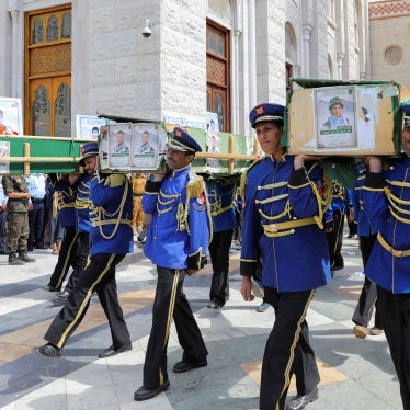 Honor guards carry the coffins of Houthi fighters killed by US-led airstrikes during a funeral in Sanaa, Yemen, February 10, 2024. 