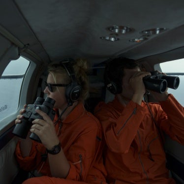 Volunteers aboard the Seabird, a plane operated by the rescue NGO Sea-Watch, look for boats in distress as they fly over the Mediterranean Sea between Libya and the Italian island of Lampedusa, October 5, 2021.