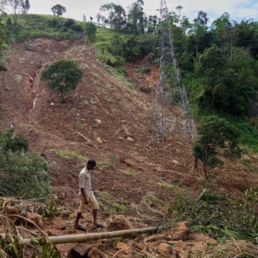 A landslide survivor searches for his belongings following Cyclone Ditwah in Kandy, Sri Lanka, December 1, 2025.