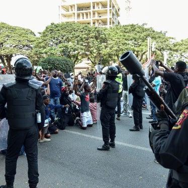 Angola's Rapid Intervention Force faces demonstrators during a protest 