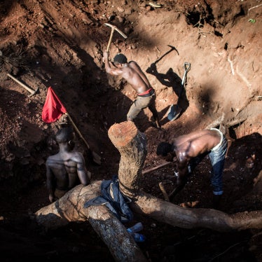 Artisanal miners excavate gold on the outskirts of Montepuez, Mozambique