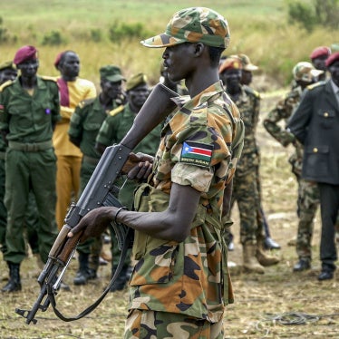 A South Sudanese soldier monitors the area as troops belonging to the South Sudanese Unified Forces take part in a deployment ceremony at the Luri Military Training Centre in Juba on November 15, 2023.