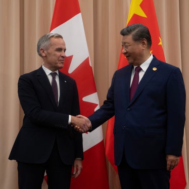 Canadian Prime Minister Mark Carney (L) with Chinese President Xi Jinping in Gyeongju, South Korea, October 31, 2025.