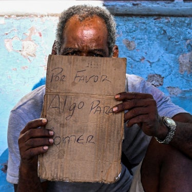 A man begs for food on a street in Havana on July 21, 2025.