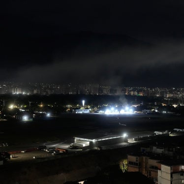 Smoke rises over an airport in Caracas, Venezuela