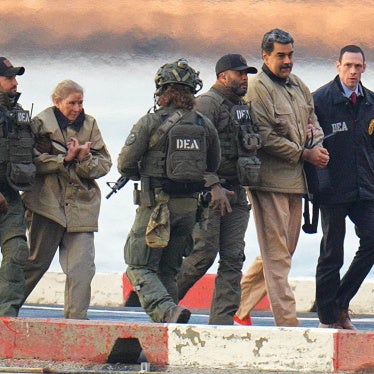 President of Venezuela Nicolás Maduro and his wife, Cilia Flores, are in handcuffs after landing at a Manhattan helipad, escorted by US Federal agents en route to a Federal courthouse in Manhattan on January 5, 2026, in New York City.